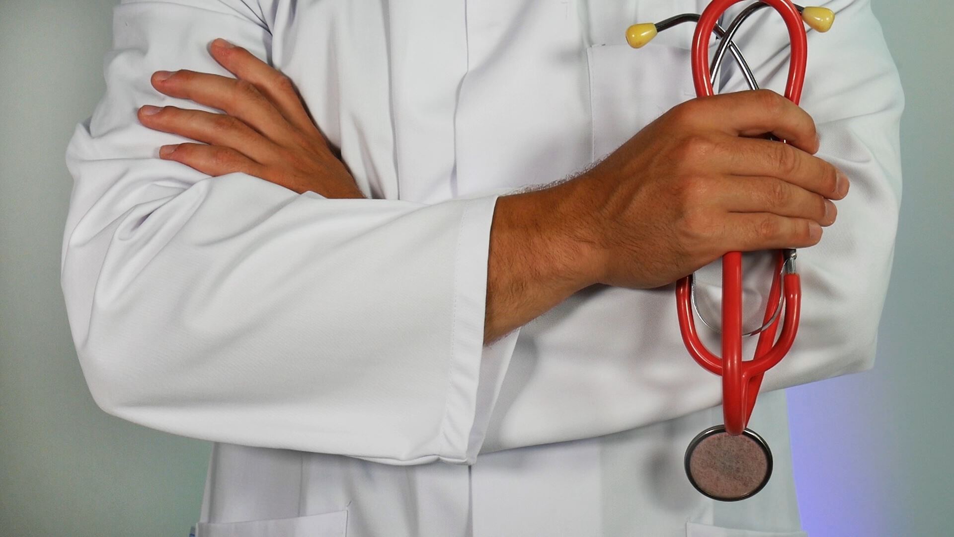 man holding a stethoscope